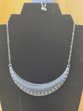 Paparazzi "Modern Day Moonshine" Textured Silver Half-Moon Rhinestone Statement Necklace Set