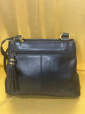 Vintage Tignanello Black Leather Shoulder Bag with Tassel Accent