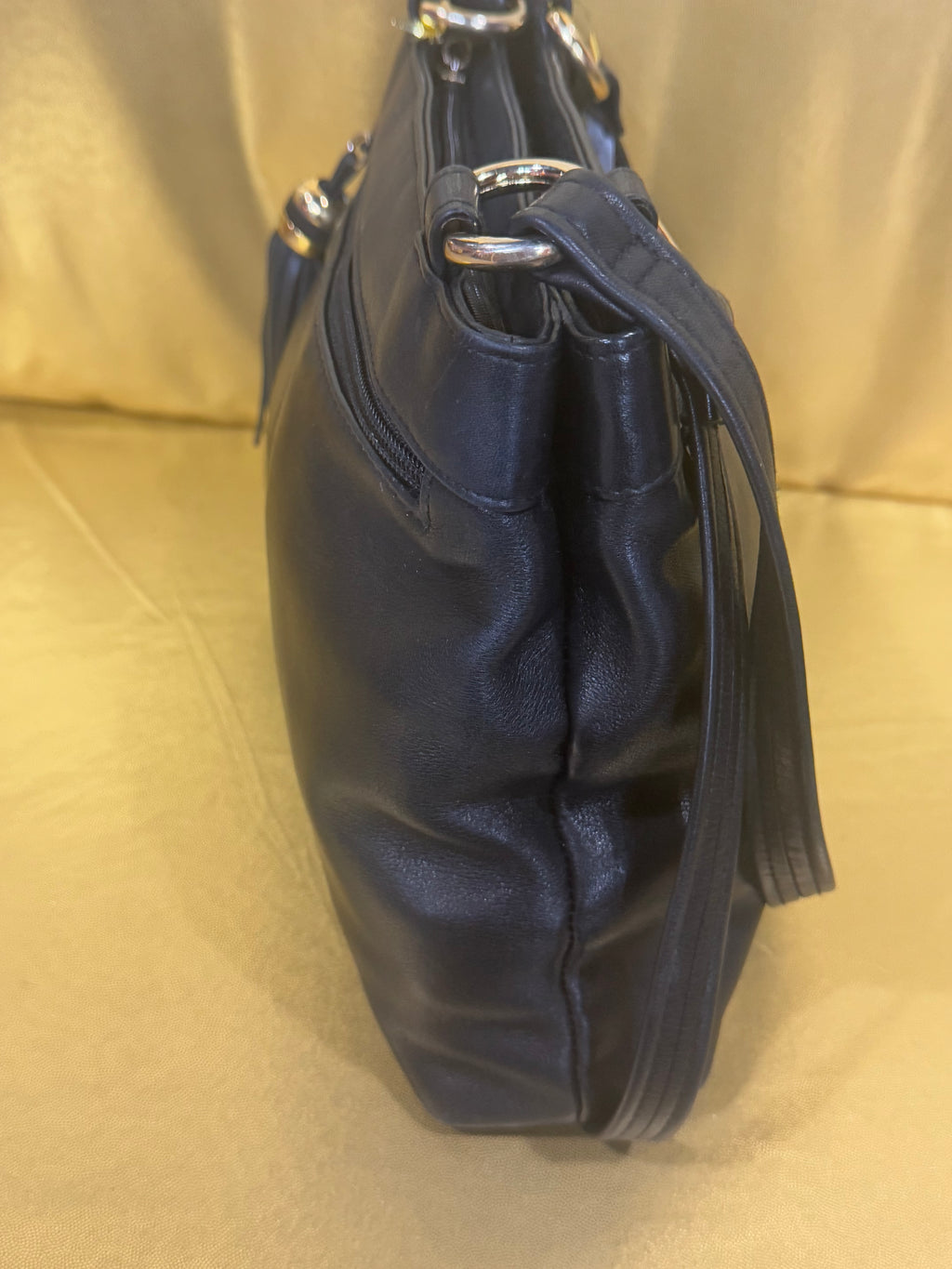 Vintage Tignanello Black Leather Shoulder Bag with Tassel Accent