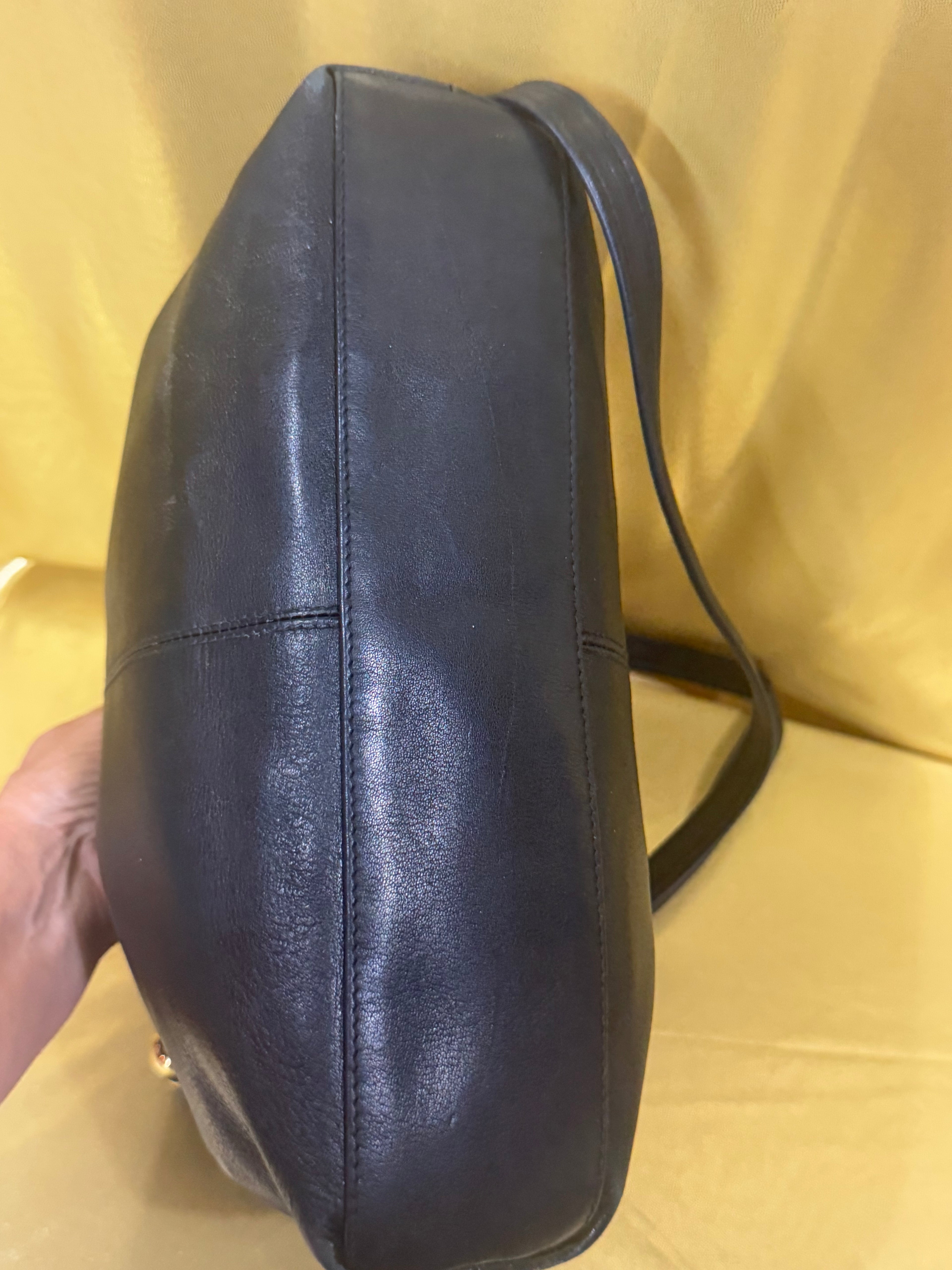 Vintage Tignanello Black Leather Shoulder Bag with Tassel Accent