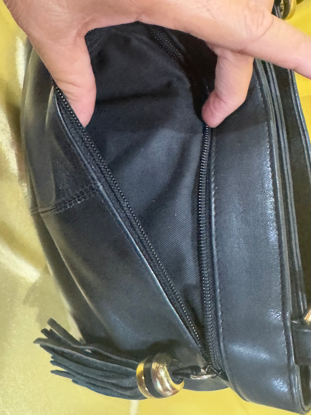 Vintage Tignanello Black Leather Shoulder Bag with Tassel Accent
