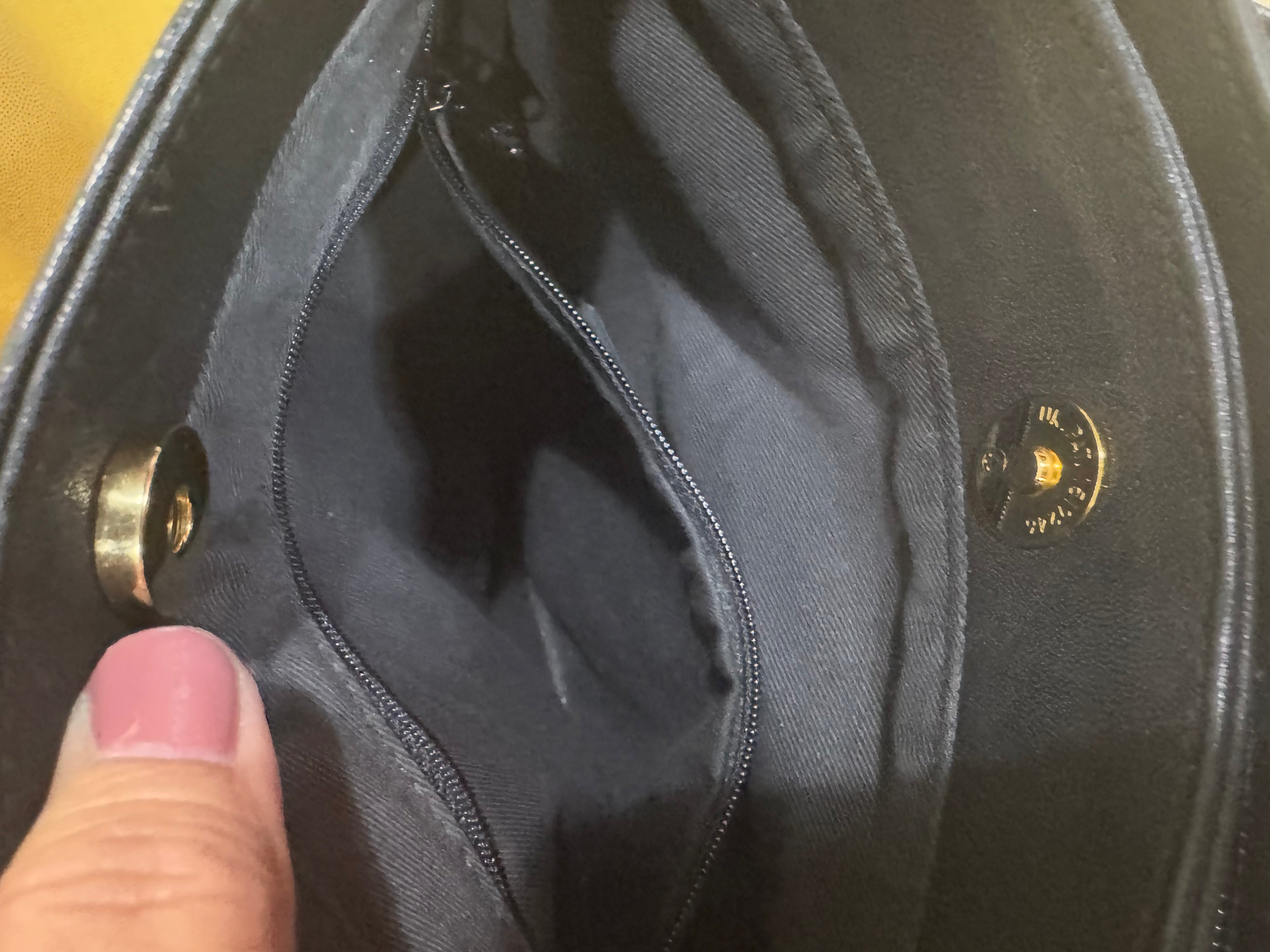 Vintage Tignanello Black Leather Shoulder Bag with Tassel Accent